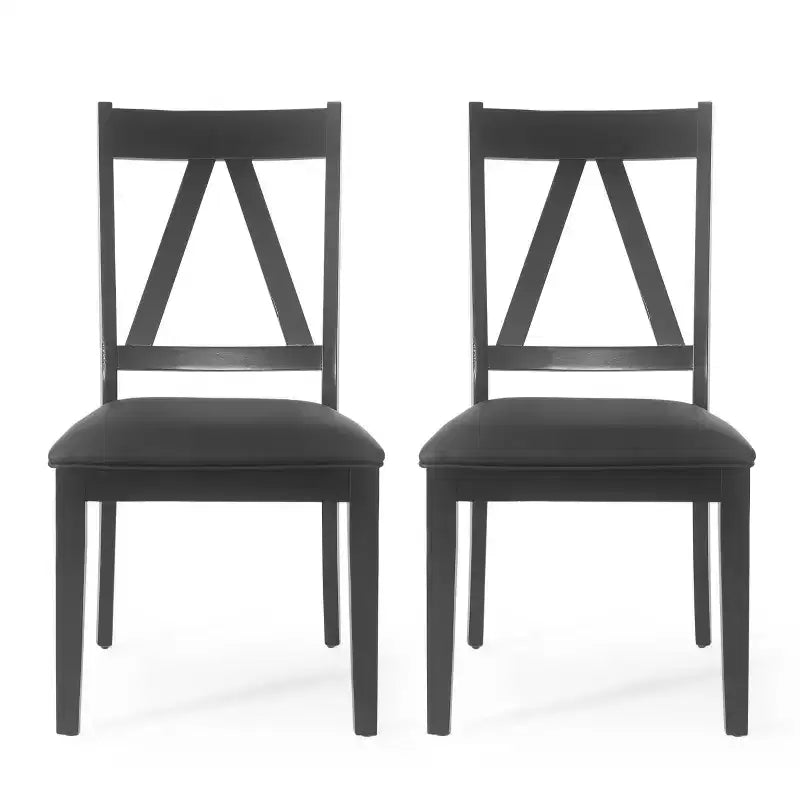 Set di 2 sedie da pranzo imbottite in stile rustico | Ecopelle | Gambe in legno di gomma | Nero